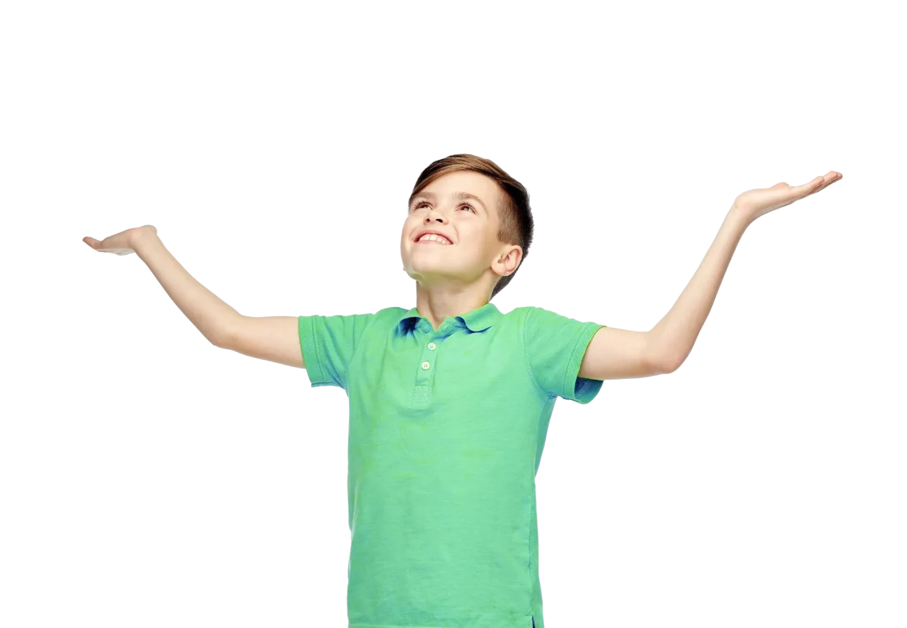 Young boy in a green t-shirt with his arms raised
